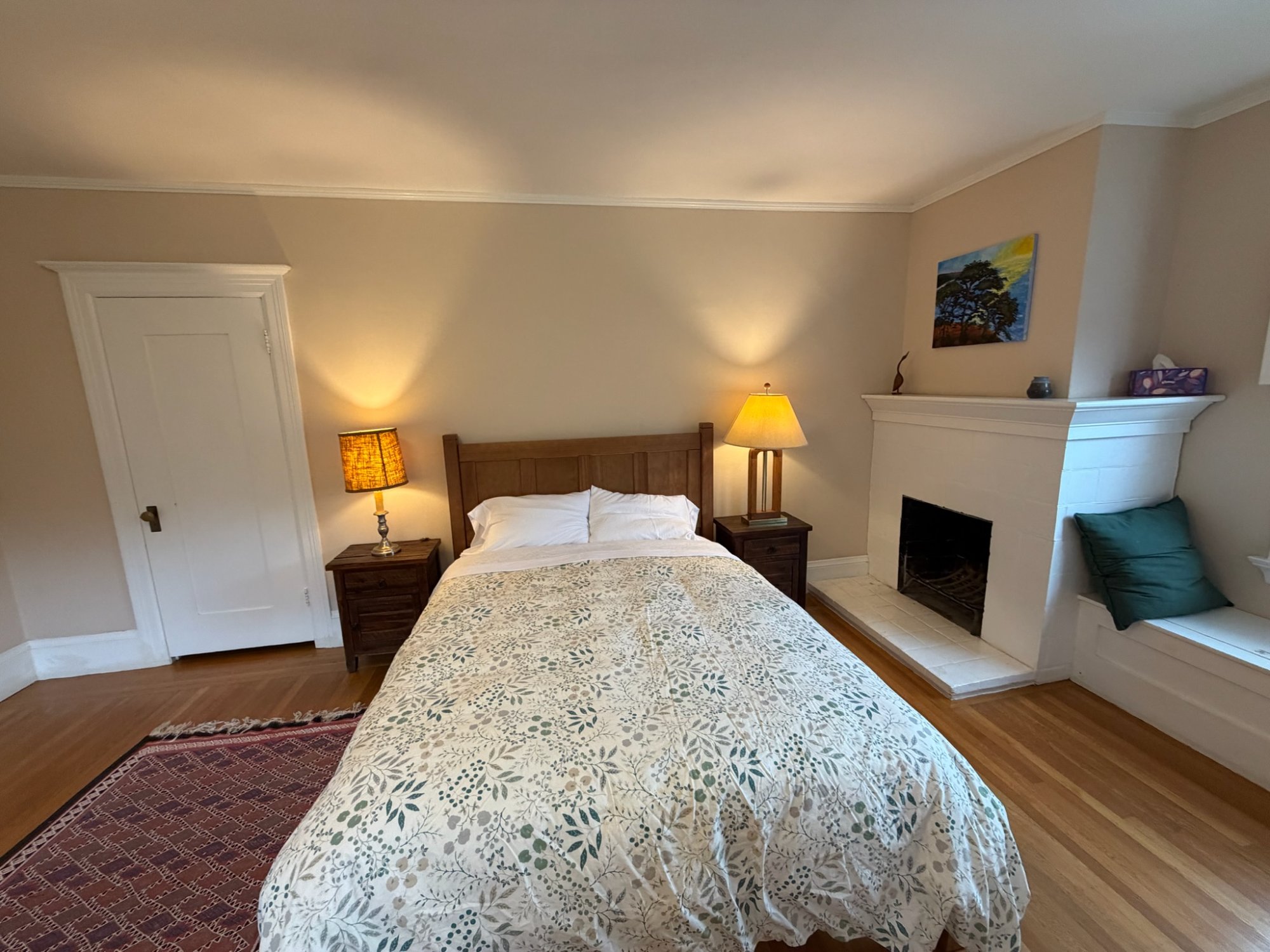 Forest East Bedroom with queen bed and fireplace