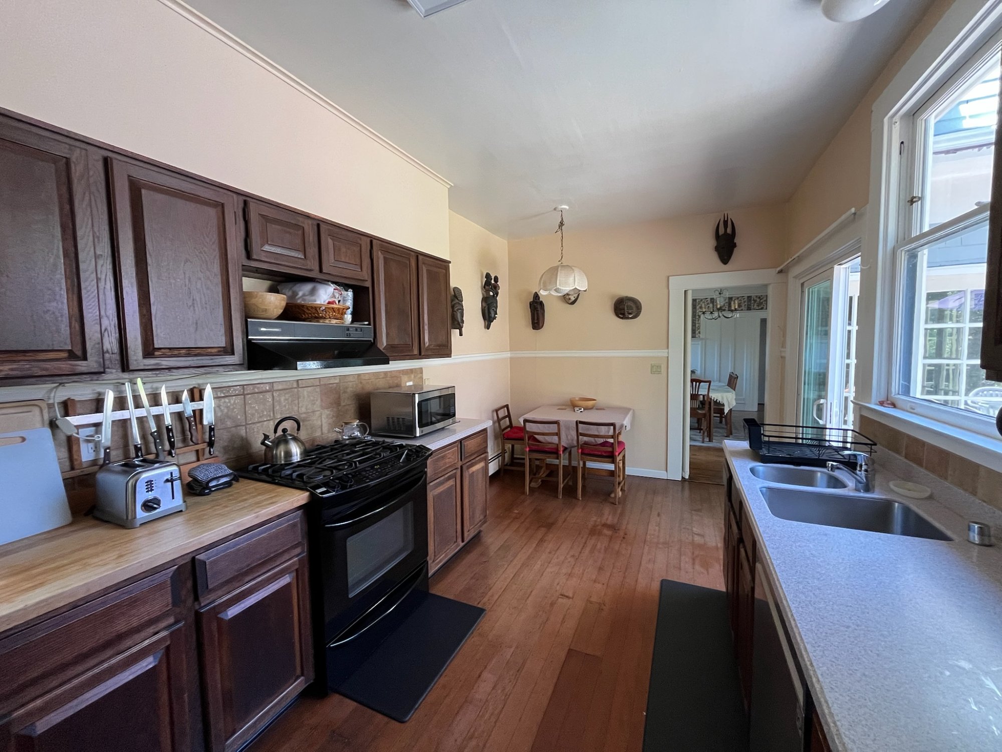 Kitchen with dining area and backyard access