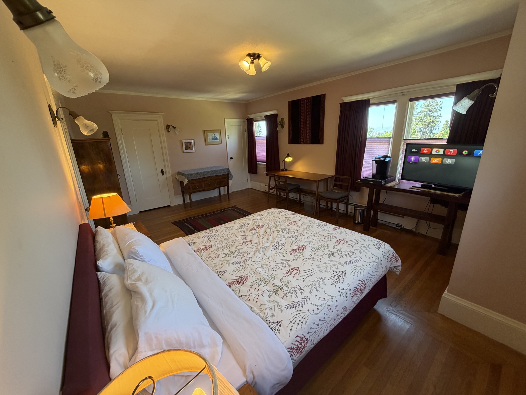 West bedroom from bed showing desk area and TV