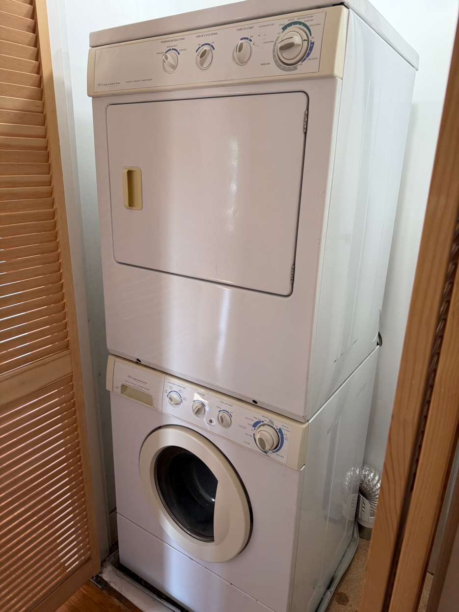 In-unit stacked washer and dryer