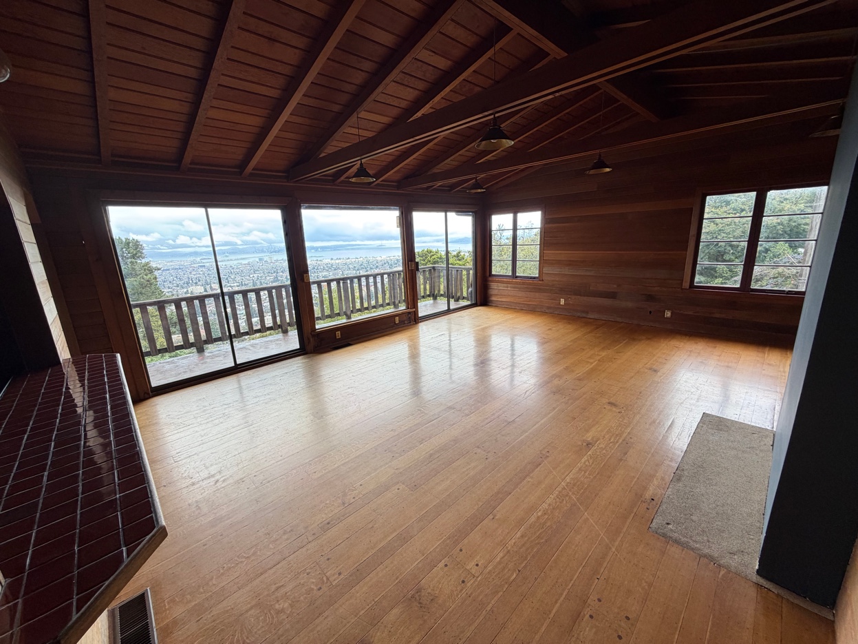Vaulted living room with panoramic Bay views