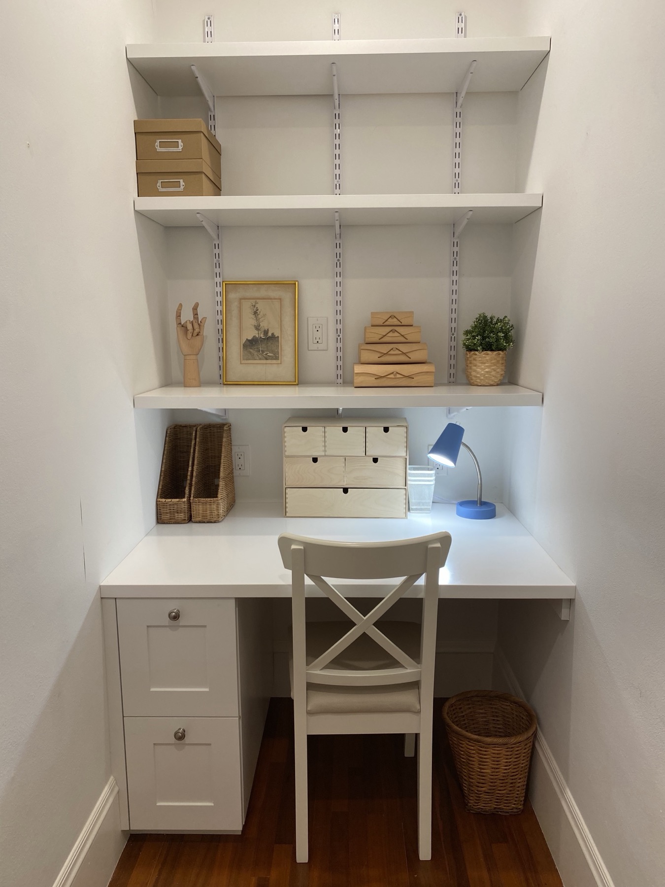 Dedicated office nook with built-in desk and shelving