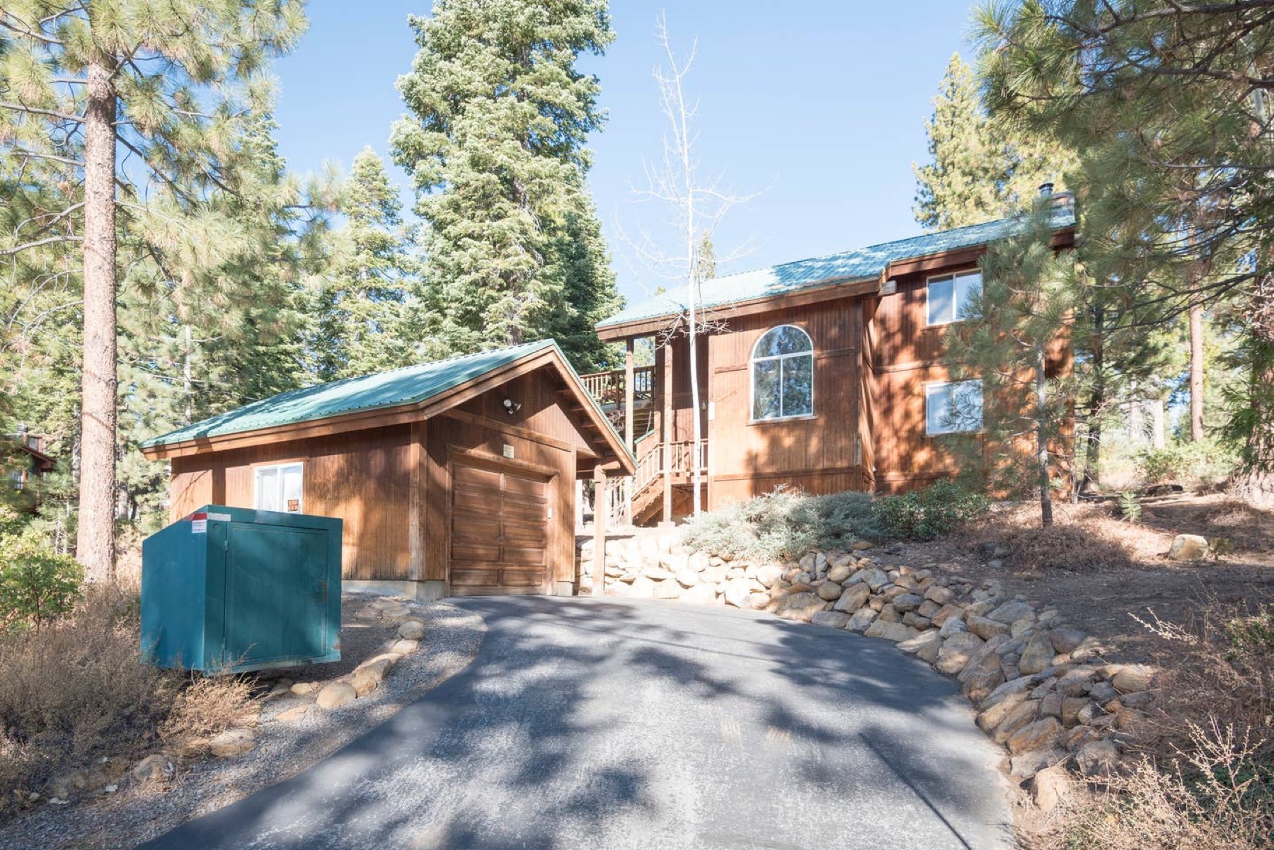 Front exterior of the Tahoe House nestled in Sierra pines